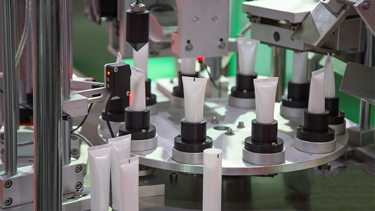 A photograph of a contract manufacturing production line for CPG products