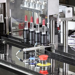 Photograph of cosmetics on the production line in a manufacturing plant.