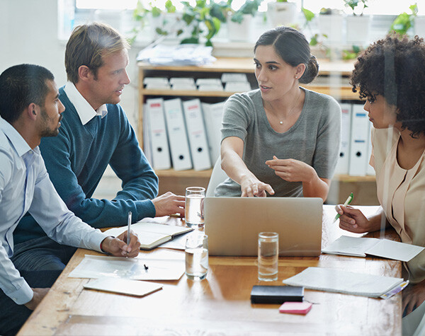 Group of executives deciding if managed services provider can help the company