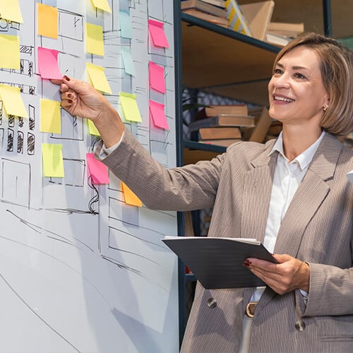 A woman examining business processes so the company can create workforce alignment